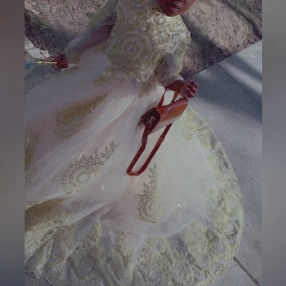 A ball gown for a young girl.